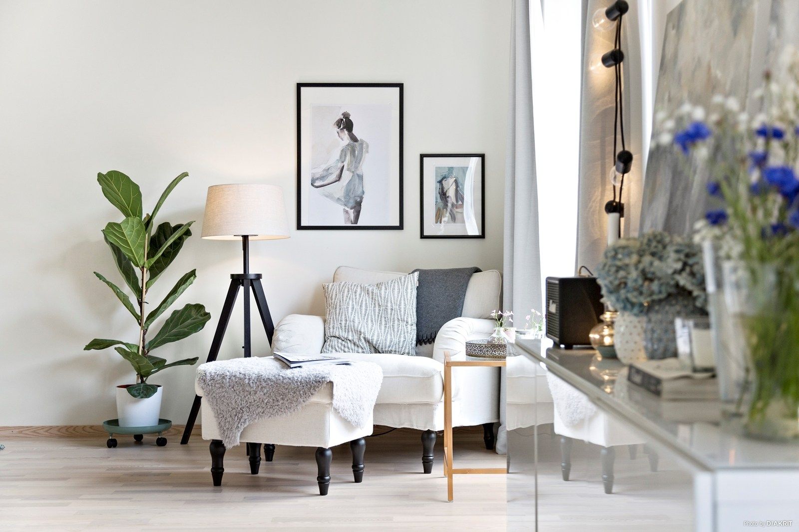 Bright natural light across a calm Scandinavian room with simple seasonal decor